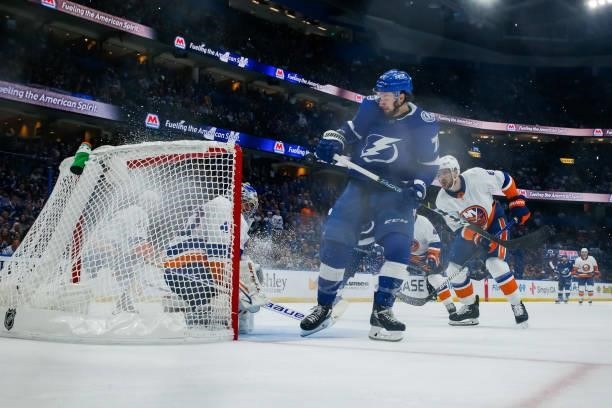 Anthony Cirelli of the Tampa Bay Lightning looks for the puck for a goal against Semyon Varlamov of the New York Islanders in Game Five of the...