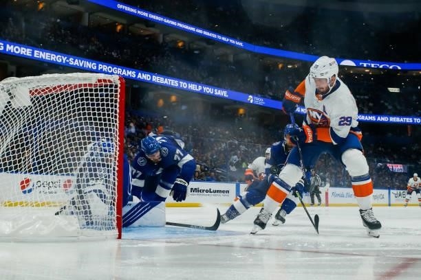 Goalie Andrei Vasilevskiy of the Tampa Bay Lightning stretches to make a save against Brock Nelson of the New York Islanders in Game Five of the...