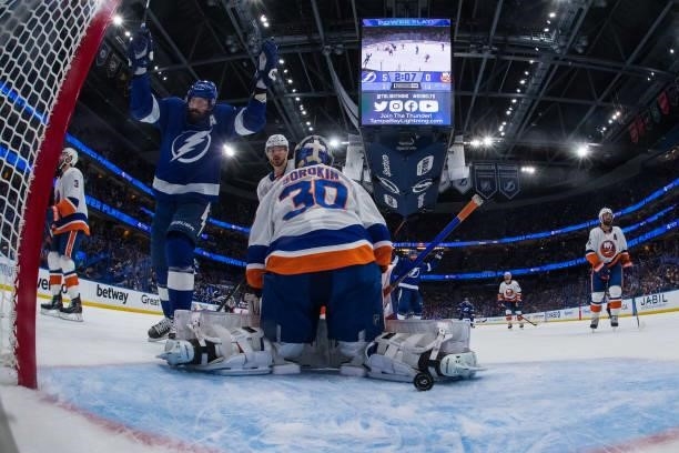 Goalie Ilya Sorokin of the New York Islanders gives up a goal against Alex Killorn of the Tampa Bay Lightning in Game Five of the Stanley Cup...