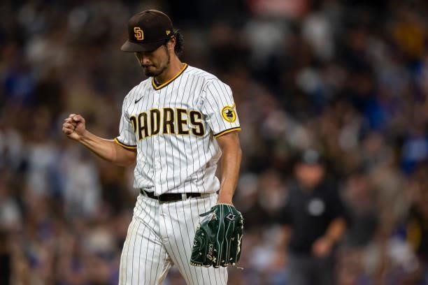 Yu Darvish of the San Diego Padres pumps his fist as he walks off the field in the sixth inning against the Los Angeles Dodgers on June 21, 2021 at...