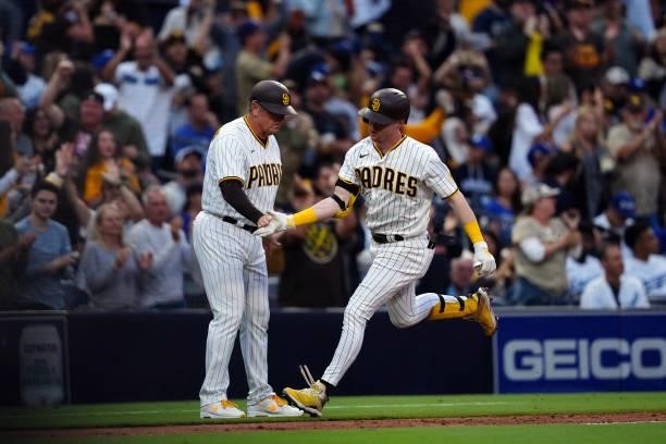 Jake Cronenworth of the San Diego Padres rounds the bases after hitting a two home run during the game between the Los Angeles Dodgers and the San...