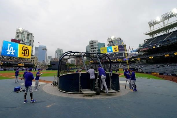 Members of the Los Angeles Dodgers warmup during batting practice before the game between the Los Angeles Dodgers and the San Diego Padres at Petco...