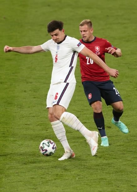 Harry Maguire of England in action with Matej Vydra of Czech Republic during the UEFA Euro 2020 Championship Group D match between Czech Republic and...