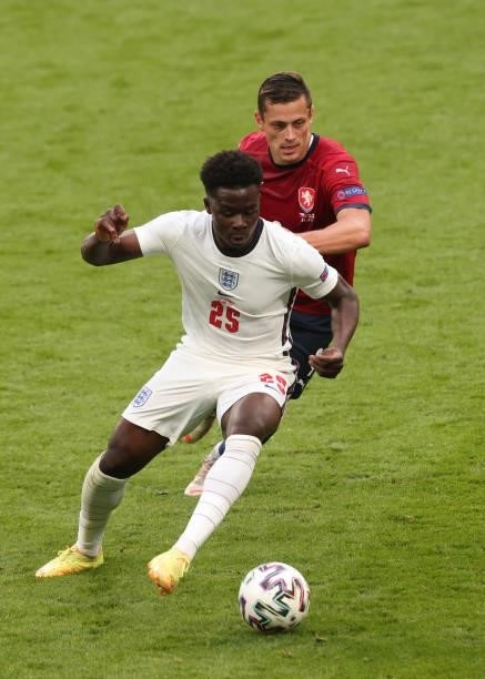 Bukayo Saka of England in action with Tomas Holes of Czech Republic during the UEFA Euro 2020 Championship Group D match between Czech Republic and...
