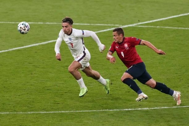 Jack Grealish of England in action with Tomas Holes of Czech Republic during the UEFA Euro 2020 Championship Group D match between Czech Republic and...
