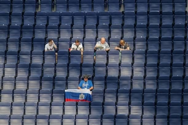 Football fans sit in the tribunes before the UEFA EURO 2020 Group E football match between Sweden and Poland at Saint Petersburg Stadium in Saint...