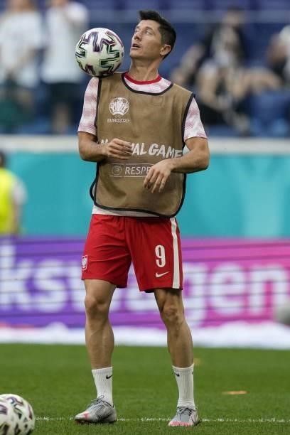 Poland's forward Robert Lewandowski warms up before the UEFA EURO 2020 Group E football match between Sweden and Poland at Saint Petersburg Stadium...