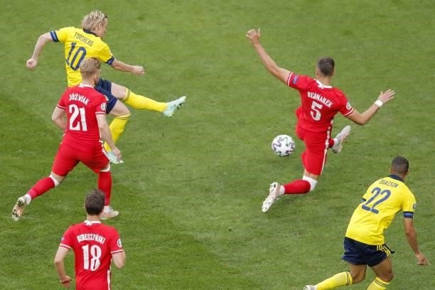 Sweden's midfielder Emil Forsberg shoots and scores his team's first goal during the UEFA EURO 2020 Group E football match between Sweden and Poland...