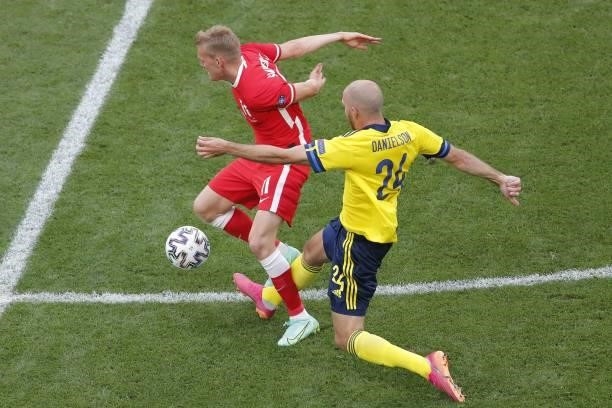 Sweden's defender Marcus Danielsson fouls Poland's forward Karol Swiderski leading to a yellow card during the UEFA EURO 2020 Group E football match...