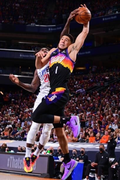 Patrick Beverley of the LA Clippers blocks the shot Devin Booker of the Phoenix Suns during Game 2 of the Western Conference Finals of the 2021 NBA...
