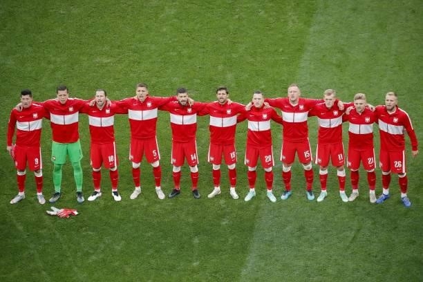 Poland's players line up prior to the UEFA EURO 2020 Group E football match between Sweden and Poland at Saint Petersburg Stadium in Saint Petersburg...