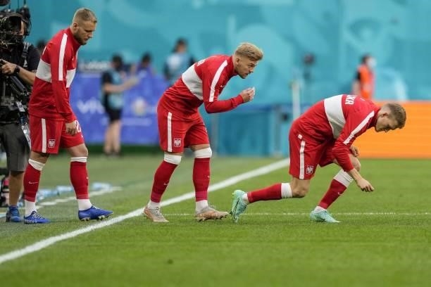 Poland's midfielder Kamil Jozwiak warms up before the UEFA EURO 2020 Group E football match between Sweden and Poland at Saint Petersburg Stadium in...