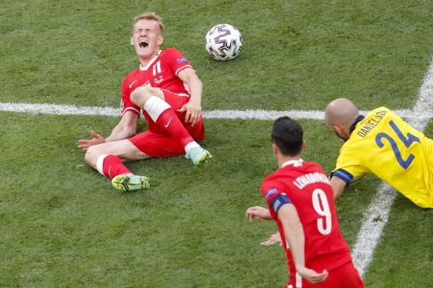 Sweden's defender Marcus Danielson fouls Poland's forward Karol Swiderski leading to a yellow card during the UEFA EURO 2020 Group E football match...