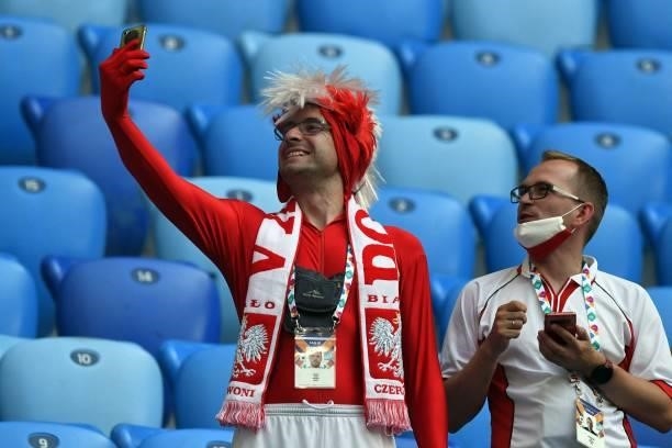Poland supporters take a selfie before the UEFA EURO 2020 Group E football match between Sweden and Poland at Saint Petersburg Stadium in Saint...