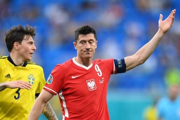 Poland's forward Robert Lewandowski reacts during the UEFA EURO 2020 Group E football match between Sweden and Poland at Saint Petersburg Stadium in...