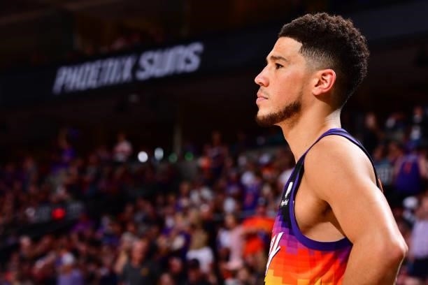 Devin Booker of the Phoenix Suns looks on against the LA Clippers during Game 2 of the Western Conference Finals of the 2021 NBA Playoffs on June 22,...