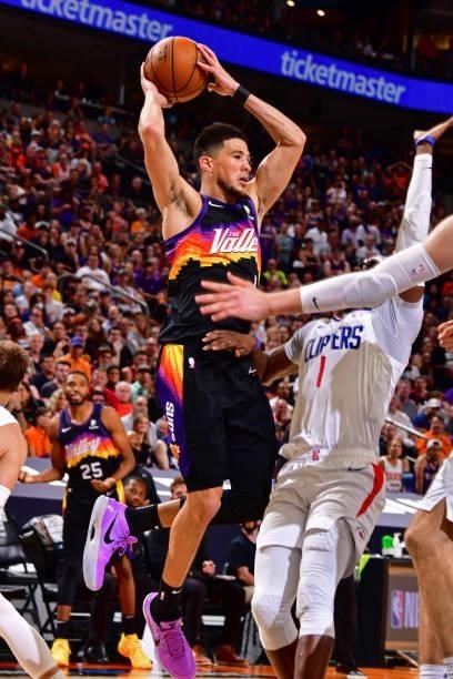 Devin Booker of the Phoenix Suns passes the ball against the LA Clippers during Game 2 of the Western Conference Finals of the 2021 NBA Playoffs on...