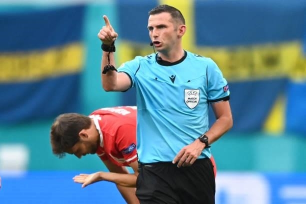 English referee Michael Oliver gestures during the UEFA EURO 2020 Group E football match between Sweden and Poland at Saint Petersburg Stadium in...