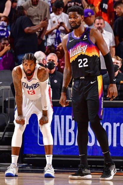 Paul George of the LA Clippers and Deandre Ayton of the Phoenix Suns looks on during Game 2 of the Western Conference Finals of the 2021 NBA Playoffs...