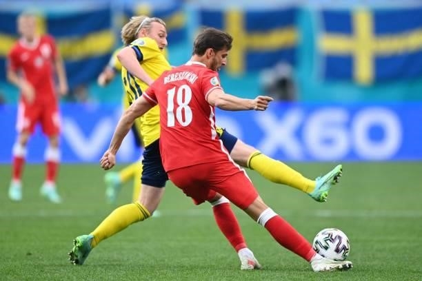 Poland's defender Bartosz Bereszynski fights for the ball with Sweden's midfielder Emil Forsberg during the UEFA EURO 2020 Group E football match...