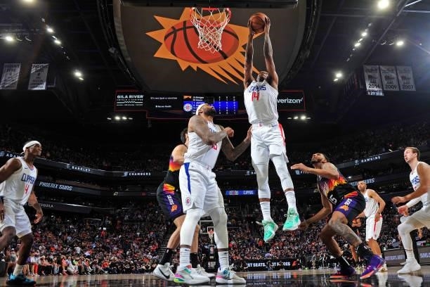 Terance Mann of the LA Clippers rebounds the ball against the Phoenix Suns during Game 2 of the Western Conference Finals of the 2021 NBA Playoffs on...