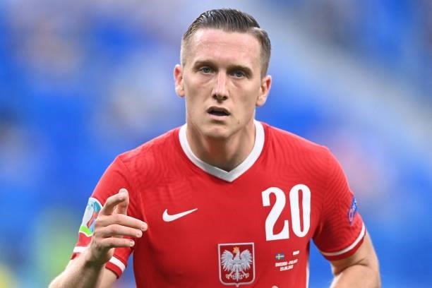 Poland's midfielder Piotr Zielinski reacts during the UEFA EURO 2020 Group E football match between Sweden and Poland at Saint Petersburg Stadium in...