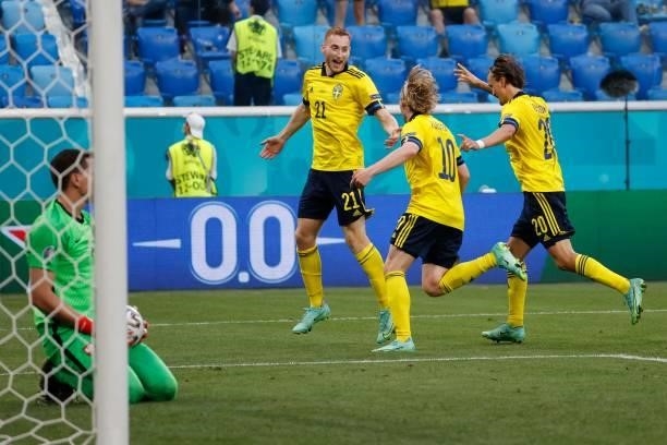 Sweden's midfielder Emil Forsberg celebrates with teammates after scoring his team's second goal during the UEFA EURO 2020 Group E football match...