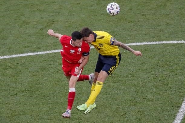 Poland's forward Robert Lewandowski fights for the ball with Sweden's defender Victor Lindelof during the UEFA EURO 2020 Group E football match...