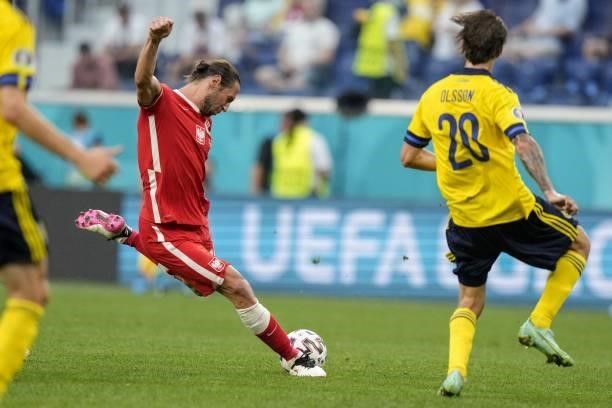 Poland's midfielder Grzegorz Krychowiak kicks the ball during the UEFA EURO 2020 Group E football match between Sweden and Poland at Saint Petersburg...