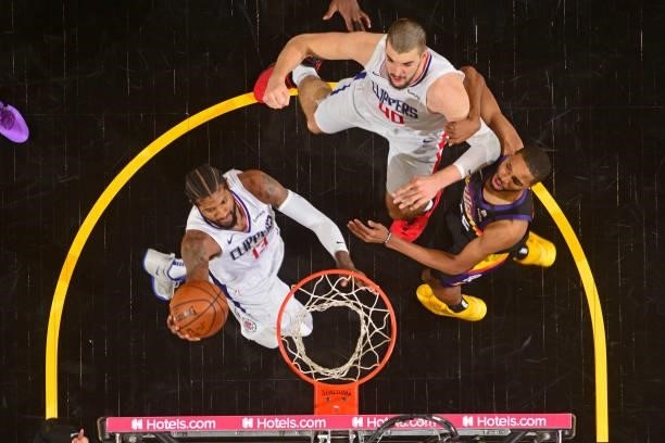 Paul George of the LA Clippers drives to the basket against the Phoenix Suns during Game 2 of the Western Conference Finals of the 2021 NBA Playoffs...