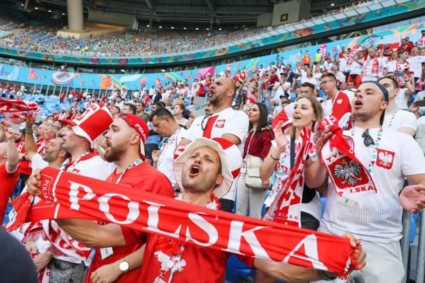 Fans of Team Poland cheer during the UEFA Euro 2020 Championship Group E match between Sweden and Poland at Saint Petersburg Stadium on June 23, 2021...