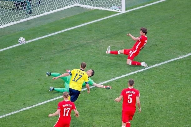 Sweden's midfielder Viktor Claesson shoots and scores his team's third goal during the UEFA EURO 2020 Group E football match between Sweden and...