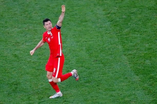 Poland's forward Robert Lewandowski celebrates after scoring his team's second goal during the UEFA EURO 2020 Group E football match between Sweden...