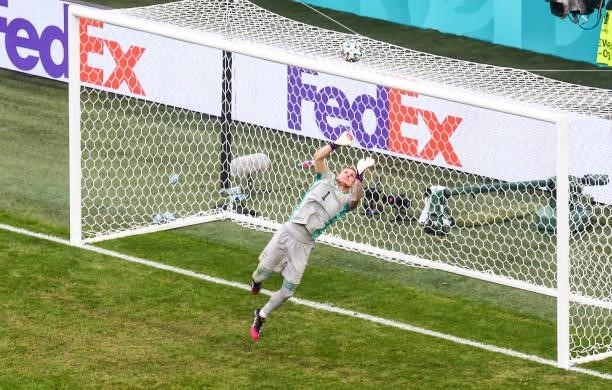 Sweden's goalkeeper Robin Olsen jumps for the ball during the UEFA EURO 2020 Group E football match between Sweden and Poland at Saint Petersburg...