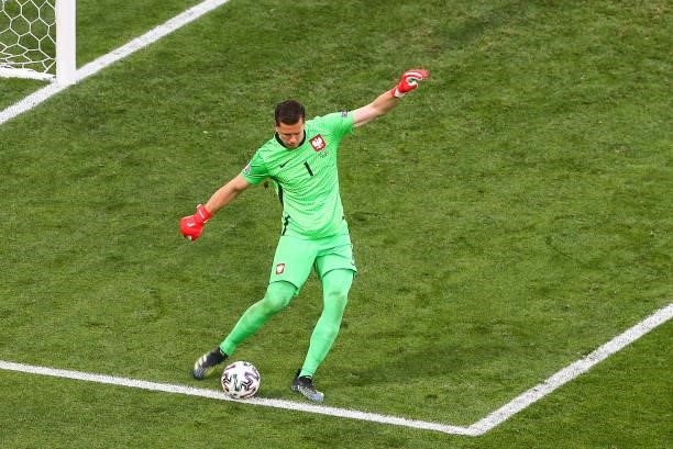 Poland's goalkeeper Wojciech Szczesny shots the ball during the UEFA EURO 2020 Group E football match between Sweden and Poland at Saint Petersburg...