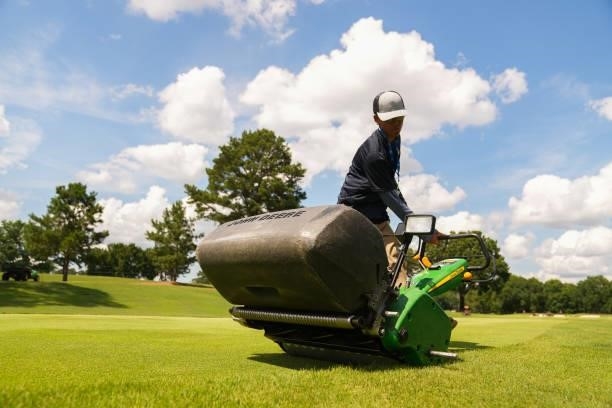 Maintenance using John Deere on the first hole during a practice round for the 2021 KPMG Women's Championship at the Atlanta Athletic Club on June...