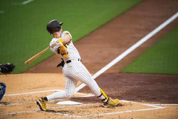 Jake Cronenworth of the San Diego Padres hits a home run in the first inning against the Los Angeles Dodgers on June 23, 2021 at Petco Park in San...