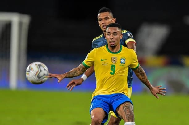 Gabriel Jesus player from Brazil disputes a bid with Barrios player from Colombia during the Group B match between Brazil and Colombia as part of...