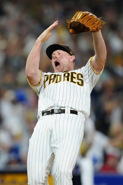 Mark Melancon of the San Diego Padres celebrates winning the game between the Los Angeles Dodgers and the San Diego Padres at Petco Park on...