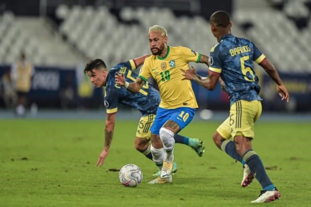Neymar player from Brazil disputes a bid with Barrios player from Colombia during the Group B match between Brazil and Colombia as part of Copa...