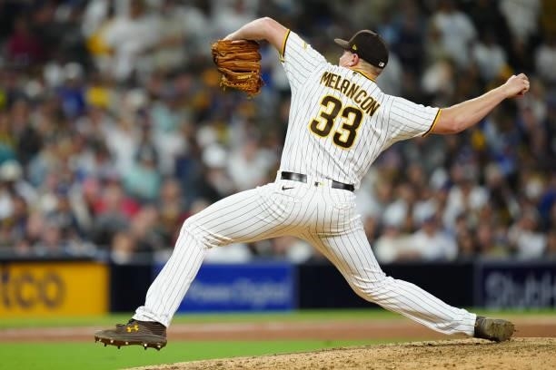 Mark Melancon of the San Diego Padres pitches during the game between the Los Angeles Dodgers and the San Diego Padres at Petco Park on Wednesday,...