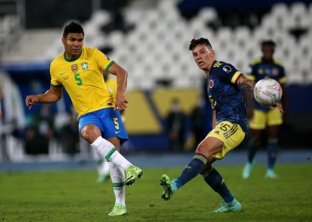 Casemiro of Brazil competes for the ball with Matheus Uribe of Colombia during the match between Brazil and Colombia as part of Conmebol Copa America...