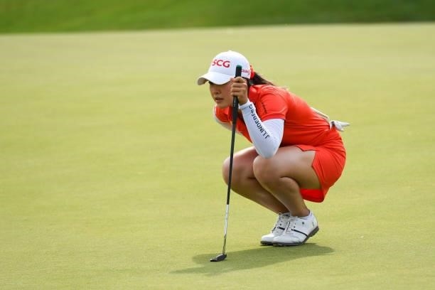 Pajaree Anannarukarn of Thailand reads her putt on the seventh hole during the first round for the 2021 KPMG Women's Championship at the Atlanta...