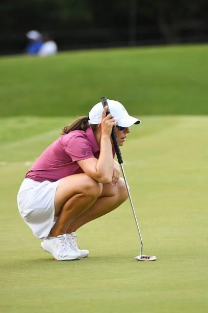 Professional, Joanna Coe reads her putt on the seventh hole during the first round for the 2021 KPMG Women's Championship at the Atlanta Athletic...