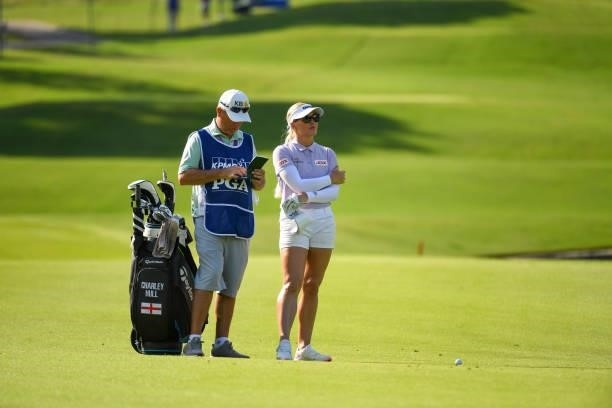 Charley Hull of England and her caddie on the eighth hole during the first round for the 2021 KPMG Women's Championship at the Atlanta Athletic Club...