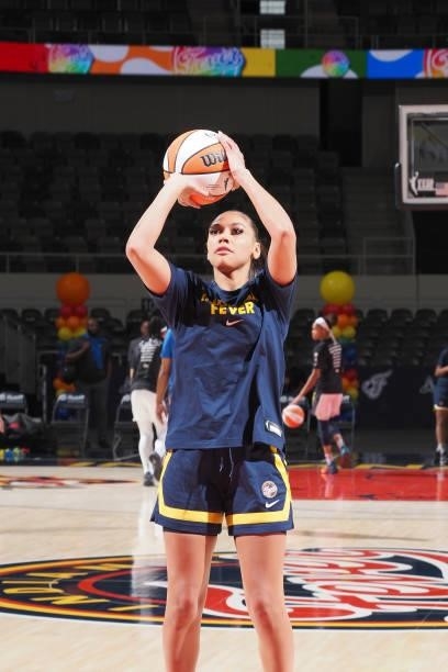 Kysre Gondrezick of the Indiana Fever shoots the ball before the game against the Dallas Wings on June 24, 2021 at Indiana Farmers Coliseum in...