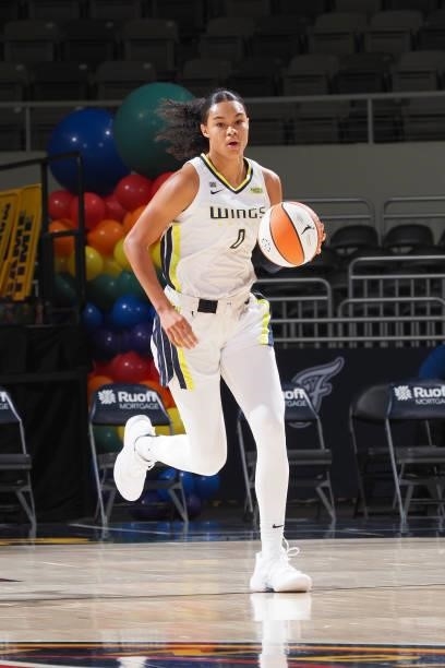 Satou Sabally of the Dallas Wings dribbles the ball against the Indiana Fever on June 24, 2021 at Indiana Farmers Coliseum in Indianapolis, Indiana....