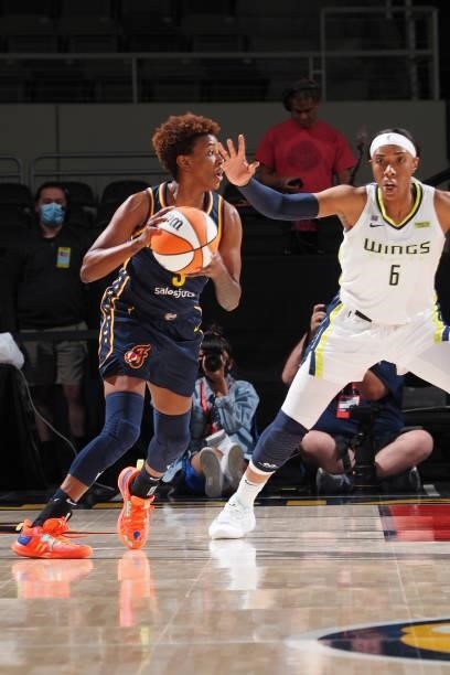 Kayla Thornton of the Dallas Wings plays defense on Danielle Robinson of the Indiana Fever on June 24, 2021 at Indiana Farmers Coliseum in...