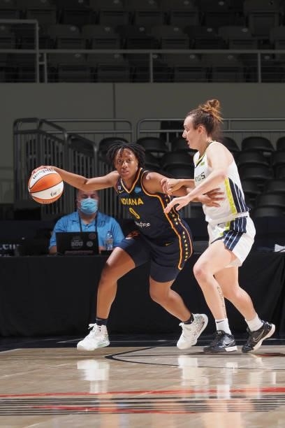 Marina Mabrey of the Dallas Wings plays defense on Kelsey Mitchell of the Indiana Fever on June 24, 2021 at Indiana Farmers Coliseum in Indianapolis,...