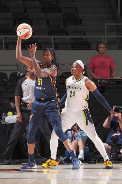 Arike Ogunbowale of the Dallas Wings plays defense on Jessica Breland of the Indiana Fever on June 24, 2021 at Indiana Farmers Coliseum in...